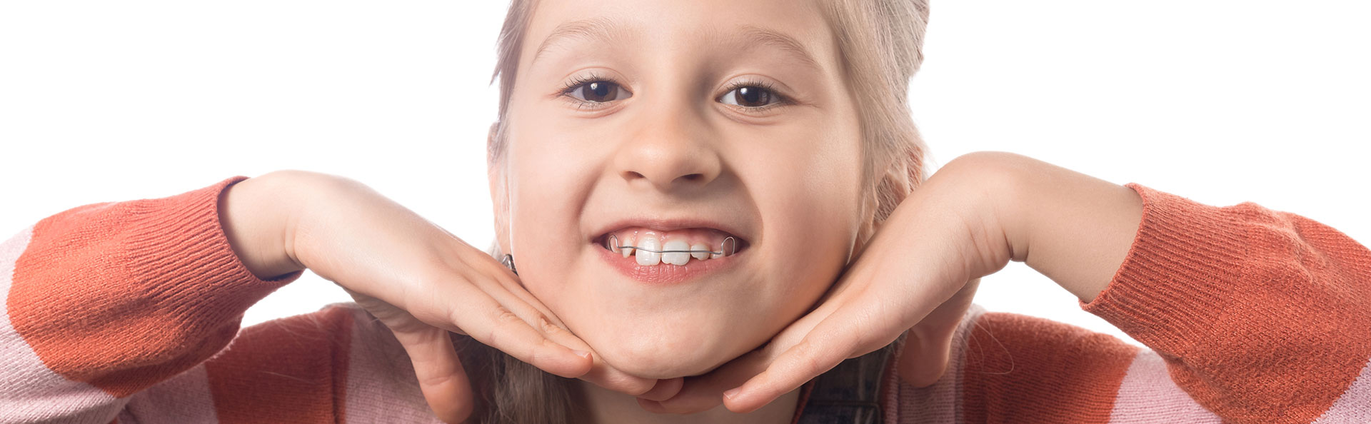 Kid smiling after Orthodontic Treatment